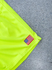 RELAXED CUT EMBROIDERED FLAG SHORTS - NEON YELLOW