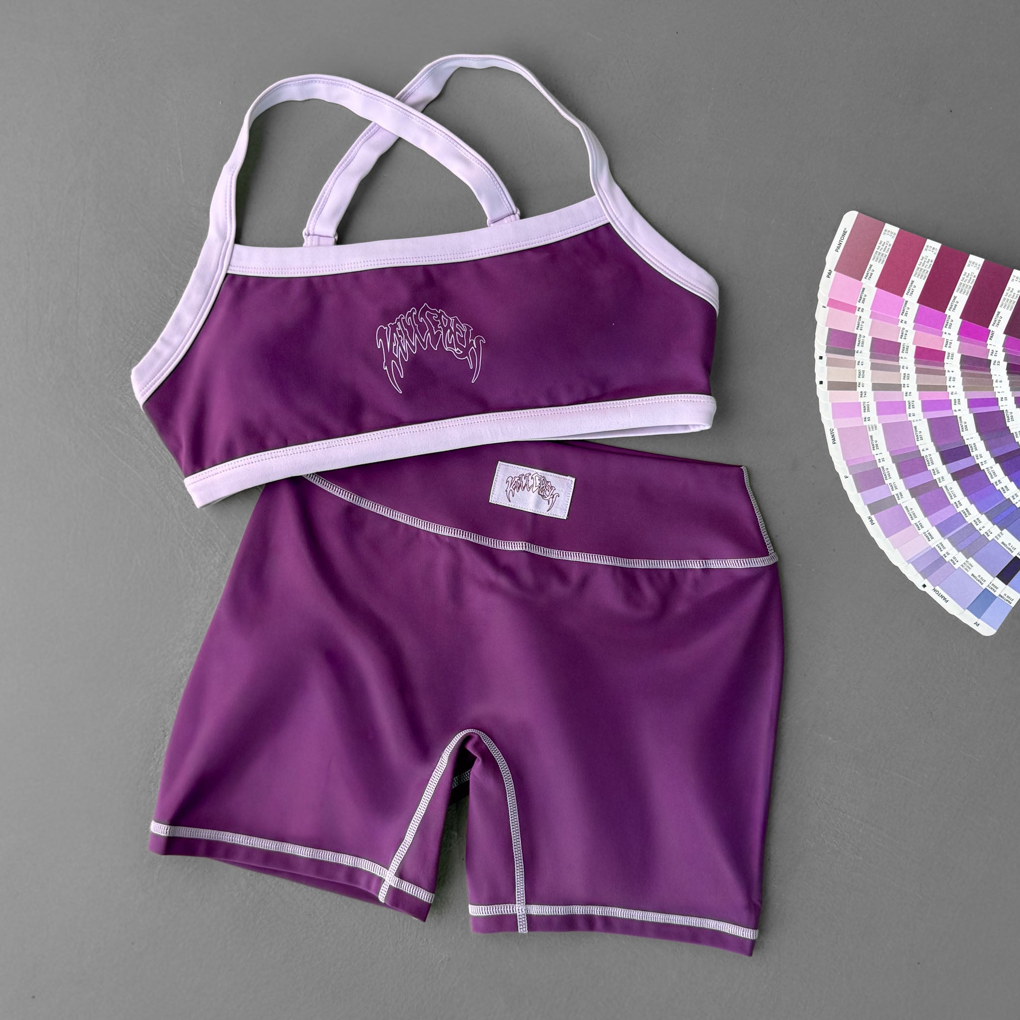 MID RISE COLOR BLOCK BIKER SHORT - PURPLE