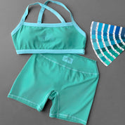 MID RISE COLOR BLOCK BIKER SHORT - TEAL