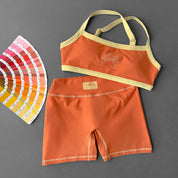 MID RISE COLOR BLOCK BIKER SHORT - ORANGE