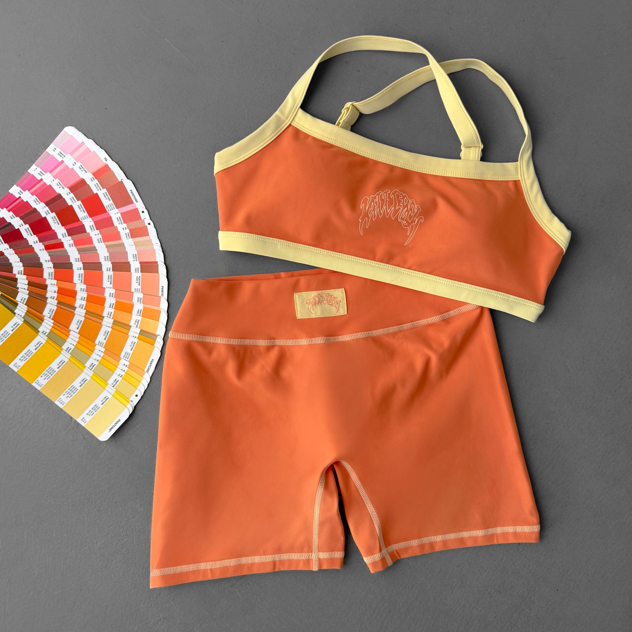 MID RISE COLOR BLOCK BIKER SHORT - ORANGE