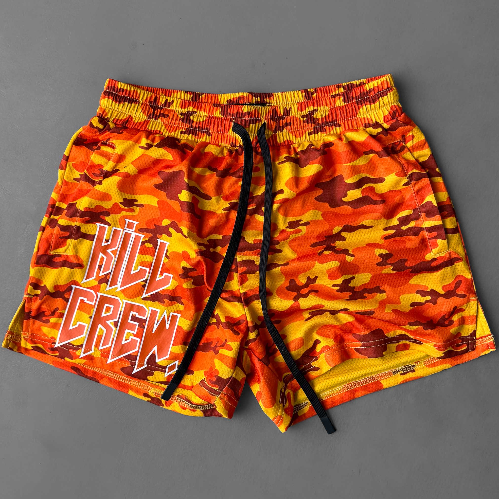 MUAY THAI SHORTS (MID THIGH CUT) - ORANGE CAMO