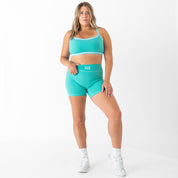MID RISE COLOR BLOCK BIKER SHORT - TEAL