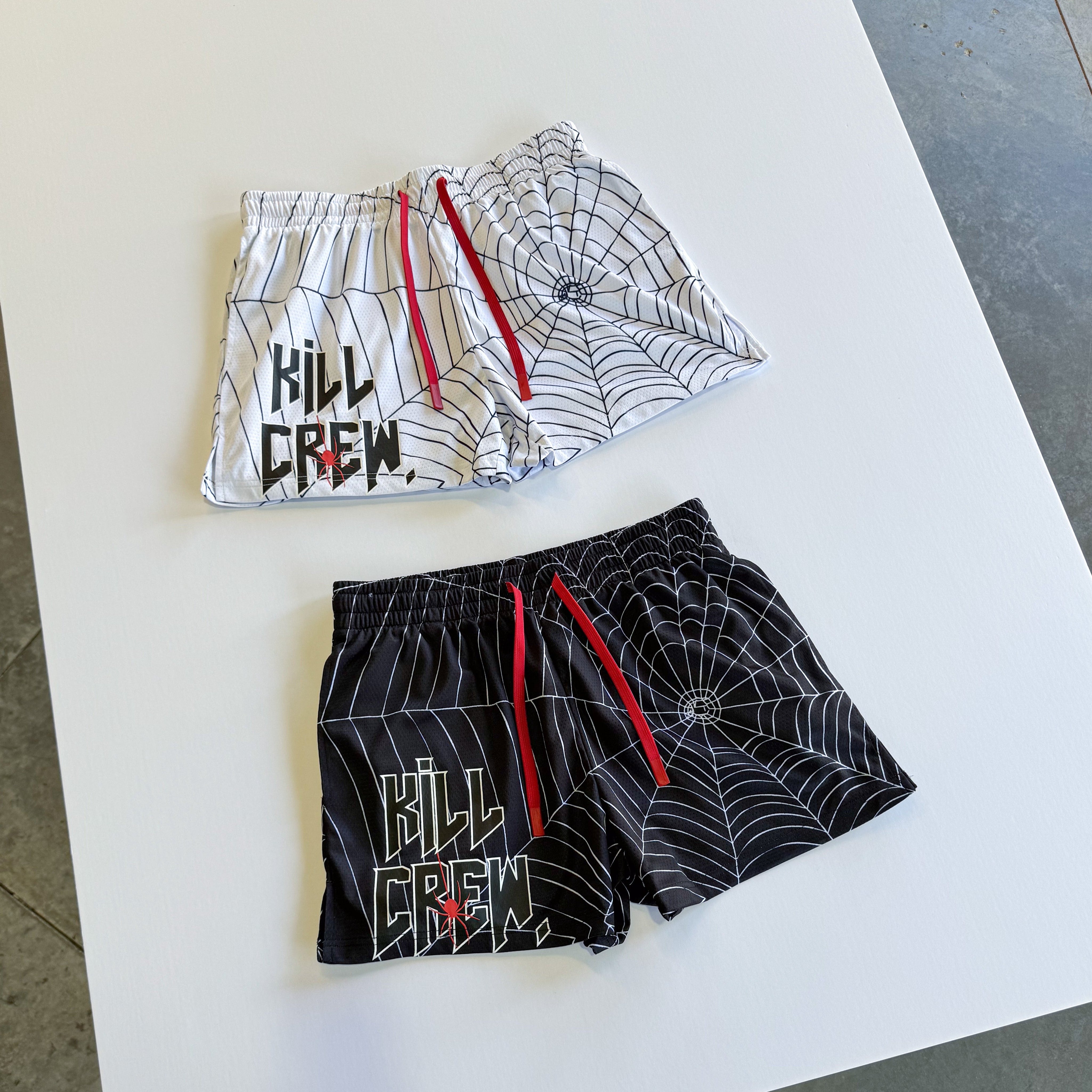 MUAY THAI SHORTS (MID THIGH CUT) SPIDER - BLACK / WHITE