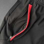 HYBRID TRAINING SHORT (7" INSEAM) - BLACK / RED
