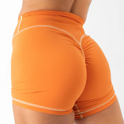 MID RISE COLOR BLOCK BIKER SHORT - ORANGE