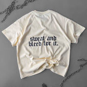 RELAXED FIT NATURAL COTTON "SWEAT & BLEED" T-SHIRT - CREAM
