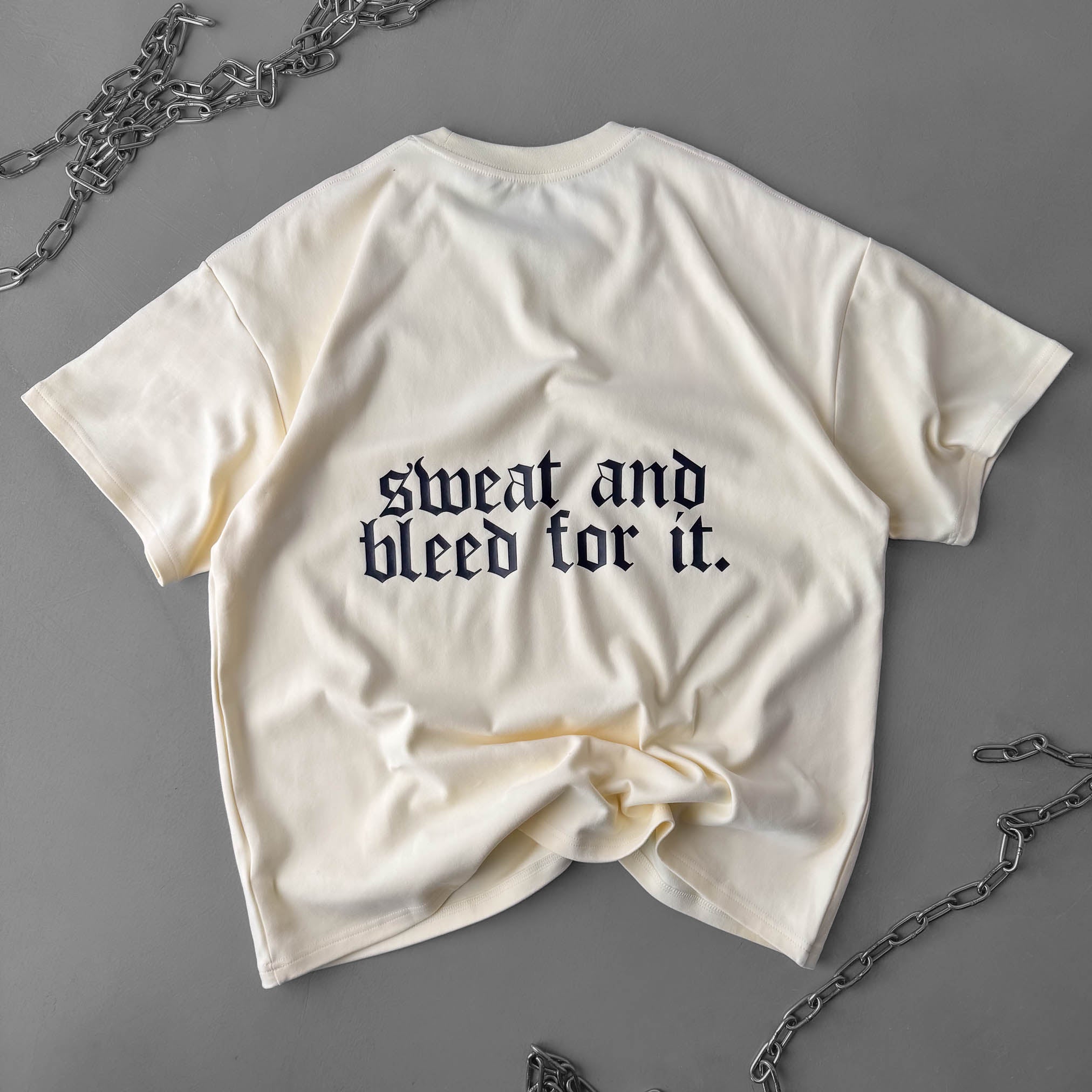 RELAXED FIT NATURAL COTTON "SWEAT & BLEED" T-SHIRT - CREAM