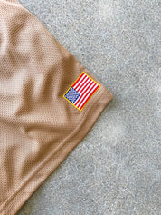 RELAXED CUT EMBROIDERED FLAG SHORTS - SAND