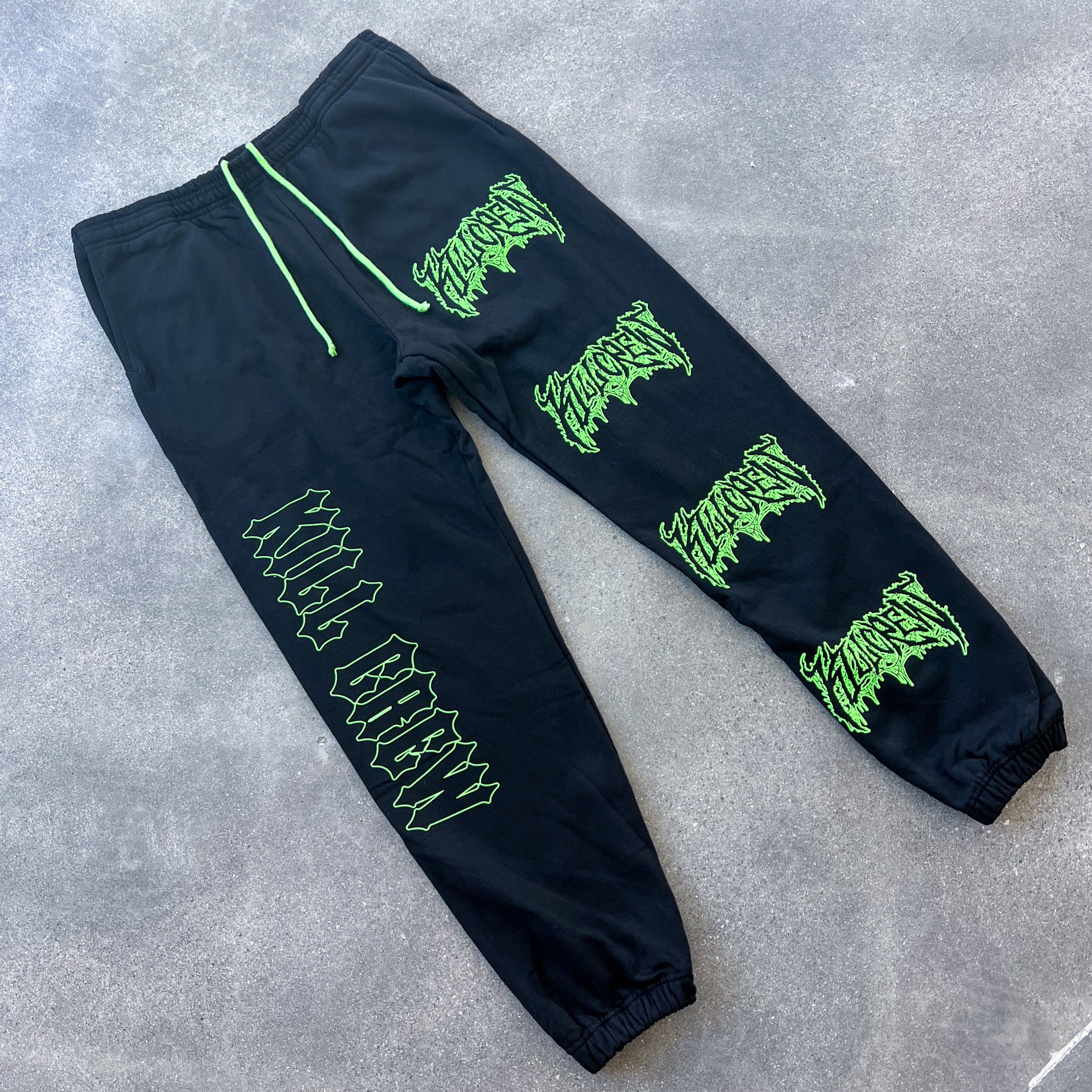 Black and green sweatpants on sale